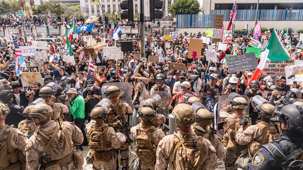 U.S. Army Soldiers and U.S. Marines provide protection to a federal building
