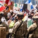 U.S. Army Soldiers and U.S. Marines provide protection to a federal building