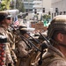 U.S. Soldiers and U.S. Marines provide protection to federal building