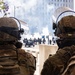 U.S. Soldiers and U.S. Marines provide protection to federal building