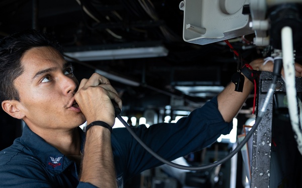 Curtis Wilbur Sailor Uses The Ship's Announcement System