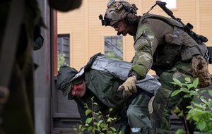 AFN Naples Radio News - Gaza Attacks and Army Ranger Earns Badge
