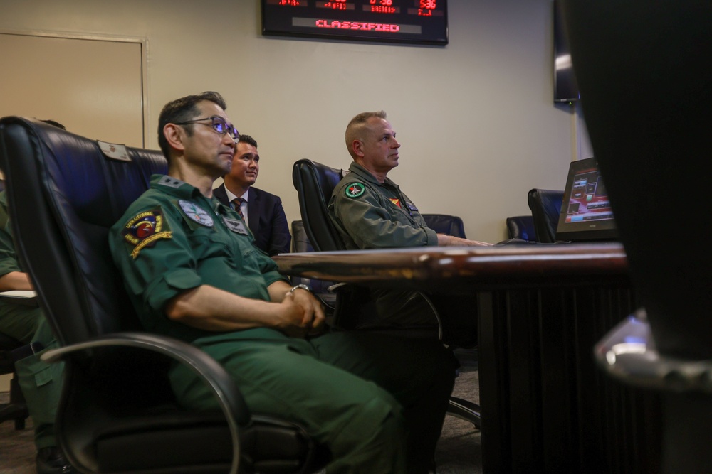 Maj. Gen. Marcus B. Annibale tours MCAS Futenma with Maj. Gen. Shimoda Toyohide, the commanding general of 9th Air wing