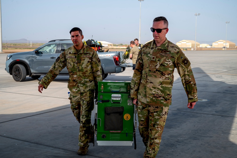 10th EAEF Personnel Load Medical Equipment for Aeromedical Mission at Camp Lemonnier