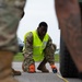 Cardinal Strike participant measures the length of a Humvee