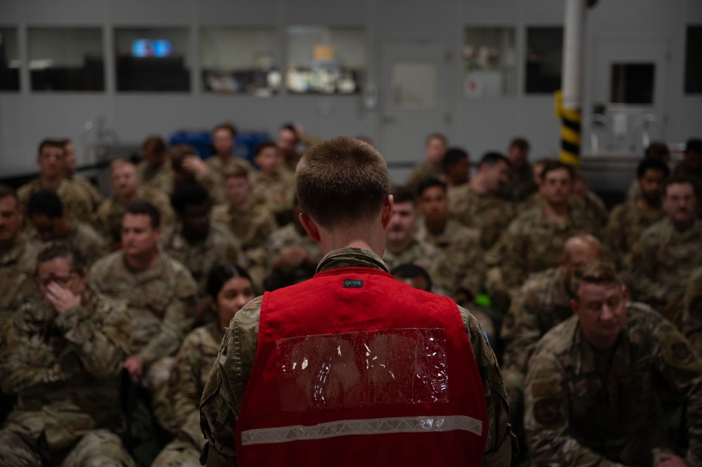 Officer In Charge speaks to participants of Cardinal Strike about deployment readiness.