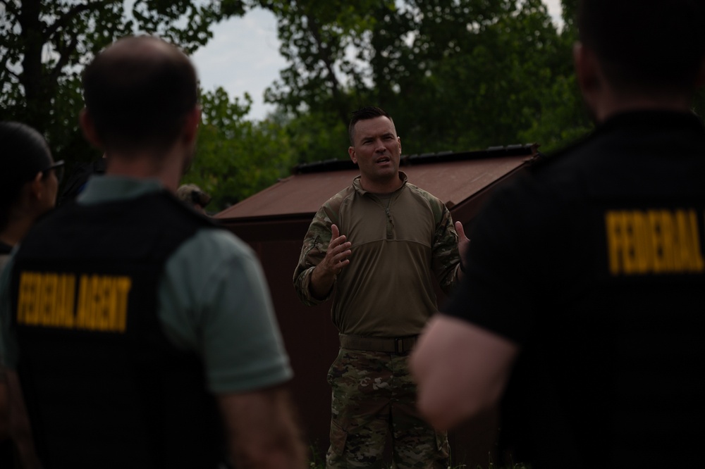 932nd airmen speak to local federal agents, working in tandem to train other airmen.