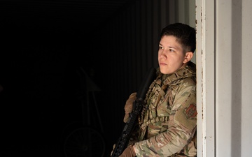 932nd airmen prepare for simulated breaching and entering movements.