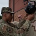 932nd airmen practice donning and taking off MOPP gear