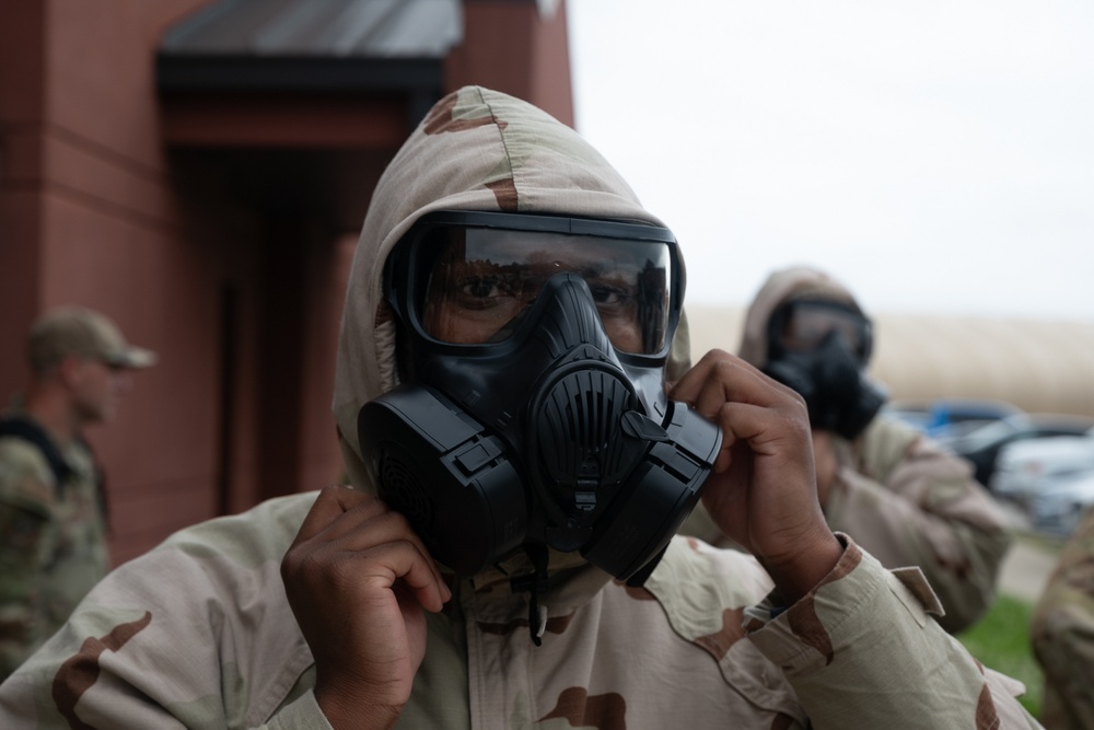 932nd airmen practice donning and taking off MOPP gear