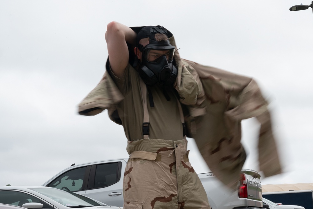 932nd airmen practice donning and taking off MOPP gear