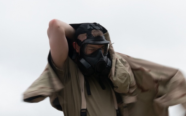 932nd airmen practice donning and taking off MOPP gear