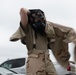 932nd airmen practice donning and taking off MOPP gear