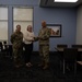 Quarterly Awards winners accept their award.