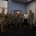 Quarterly Awards winners accept their award.