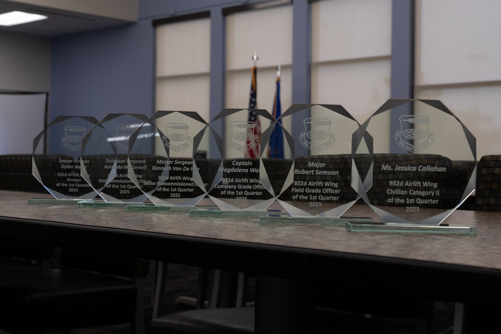 Quarterly Awards winners accept their award.