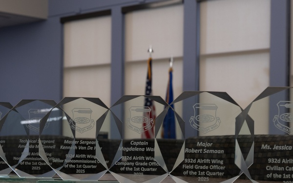 Quarterly Awards winners accept their award.