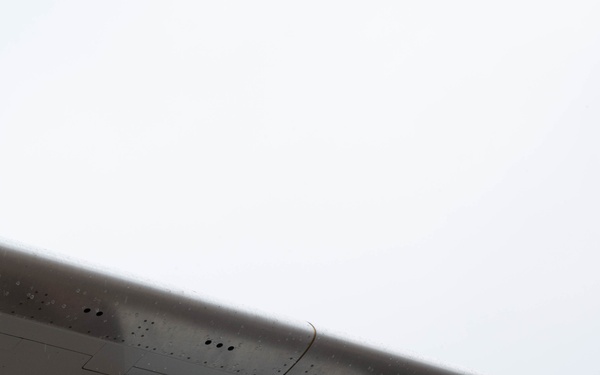 QLLEX participant assists in refueling a C-40