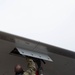 QLLEX participant assists in refueling a C-40