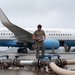QLLEX participant assists in refueling a C-40