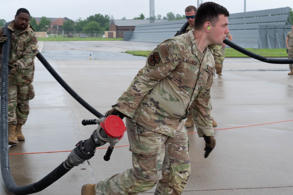 QLLEX participants assists in refueling a C-40