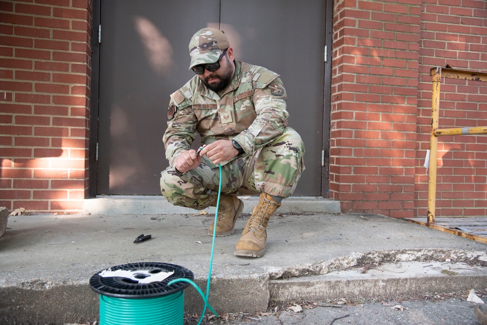 316th CES sets up auxiliary power and HVAC for Soldiers staying at Andrews in support of Army Birthday