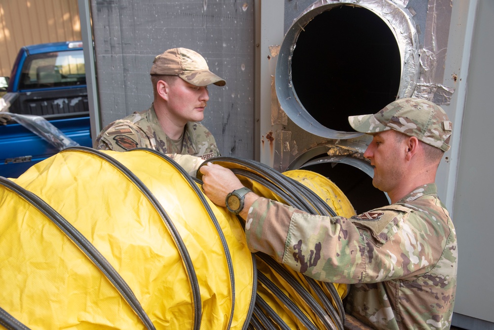 316th CES sets up auxiliary power and HVAC for Soldiers staying at Andrews in support of Army Birthday