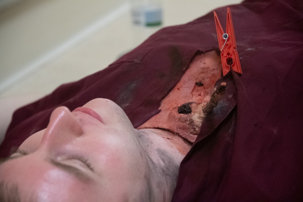 Simulated corpse gets tagged as deceased by 932nd airmen