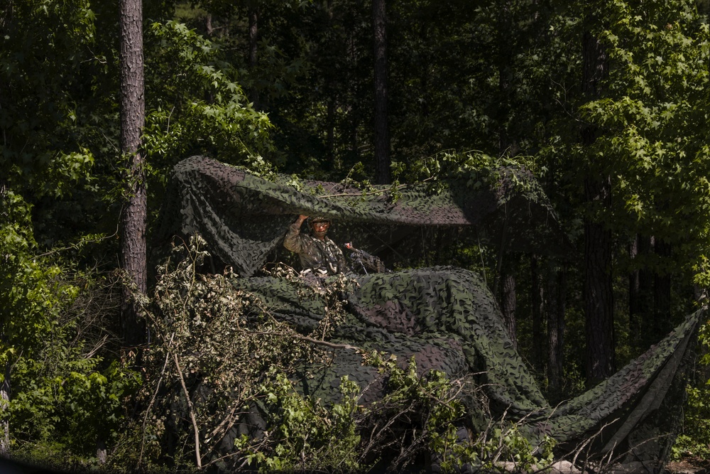 Pulling security in camouflage at JRTC