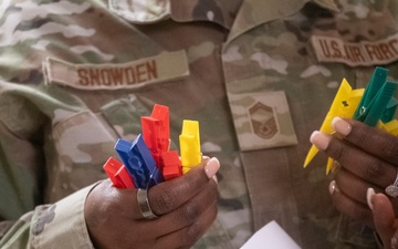 932nd airmen use colored clips to identify simulated wounded and deceased personnel.
