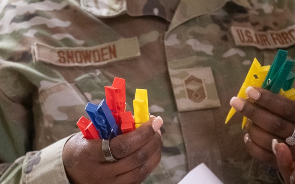 932nd airmen use colored clips to identify simulated wounded and deceased personnel.