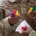932nd airmen use colored clips to identify simulated wounded and deceased personnel.