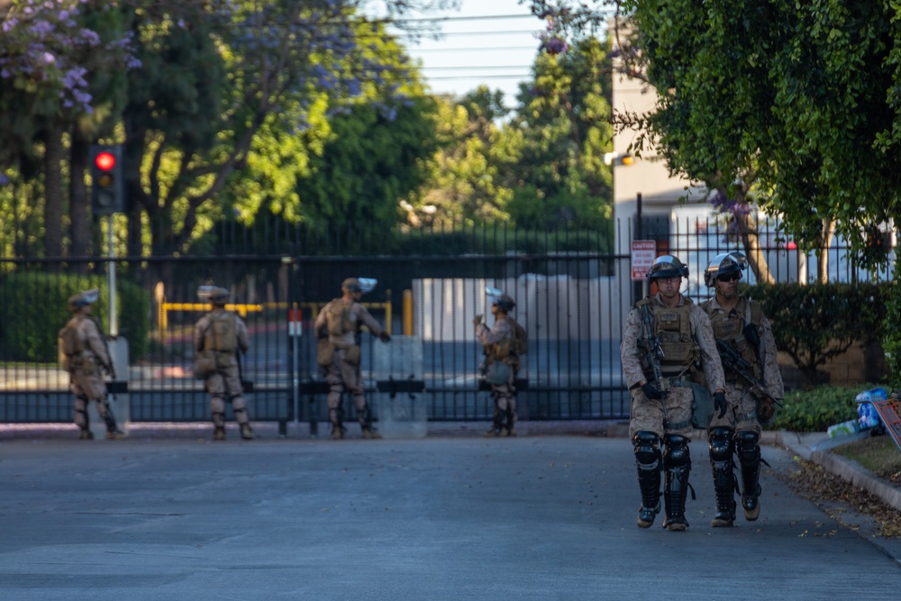 U.S. Marines guard federal building to assist California Army National Guard