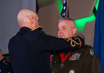 Task Force Talon Commander presents Order of Saint Barbara to recipients during the Army’s 250th Birthday Ball