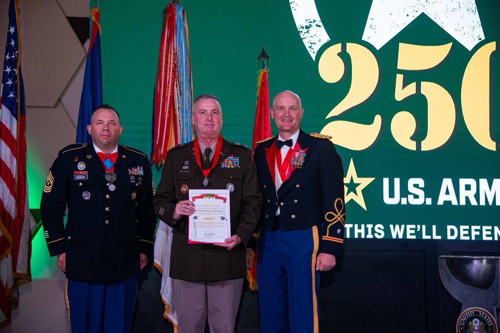 Task Force Talon Commander presents Order of Saint Barbara to recipients during the Army’s 250th Birthday Ball