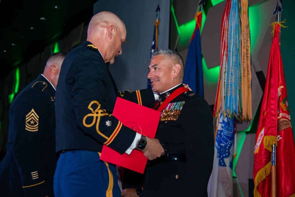 Task Force Talon Commander presents Order of Saint Barbara to recipients during the Army’s 250th Birthday Ball