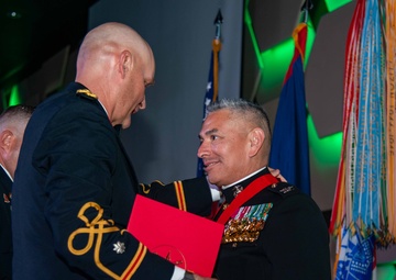 Task Force Talon Commander presents Order of Saint Barbara to recipients during the Army’s 250th Birthday Ball
