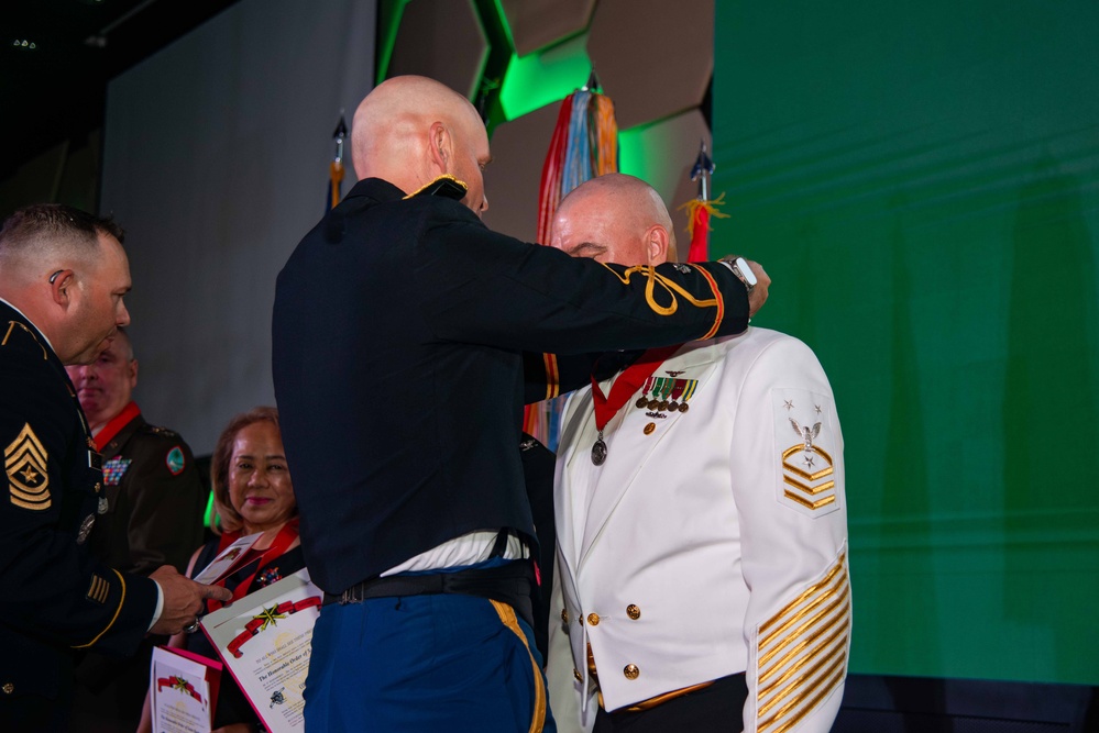Task Force Talon Commander presents Order of Saint Barbara to recipients during the Army’s 250th Birthday Ball