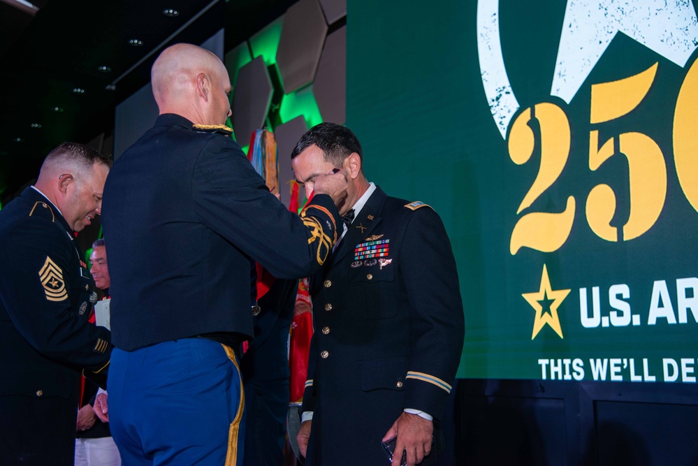 Task Force Talon Commander presents Order of Saint Barbara to recipients during the Army’s 250th Birthday Ball