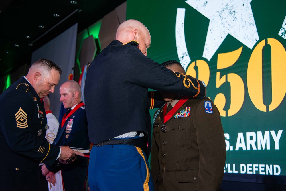 Task Force Talon Commander presents Order of Saint Barbara to recipients during the Army’s 250th Birthday Ball