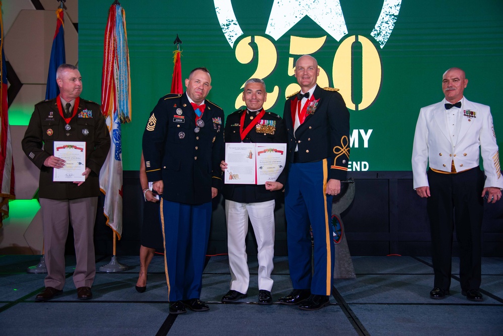 Task Force Talon Commander presents Order of Saint Barbara to recipients during the Army’s 250th Birthday Ball