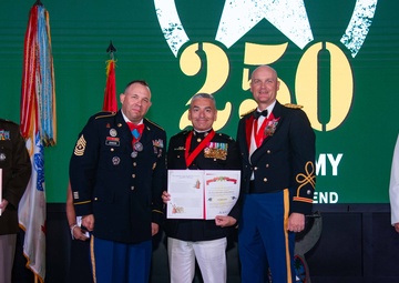 Task Force Talon Commander presents Order of Saint Barbara to recipients during the Army’s 250th Birthday Ball