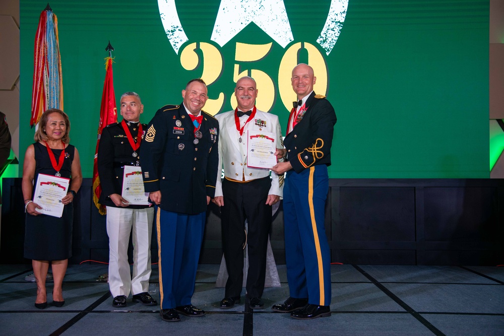 Task Force Talon Commander presents Order of Saint Barbara to recipients during the Army’s 250th Birthday Ball