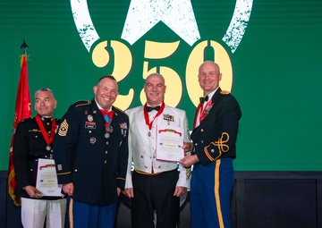 Task Force Talon Commander presents Order of Saint Barbara to recipients during the Army’s 250th Birthday Ball