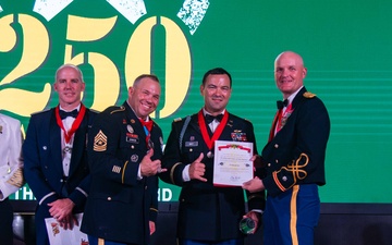 Task Force Talon Commander presents Order of Saint Barbara to recipients during the Army’s 250th Birthday Ball