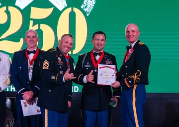 Task Force Talon Commander presents Order of Saint Barbara to recipients during the Army’s 250th Birthday Ball