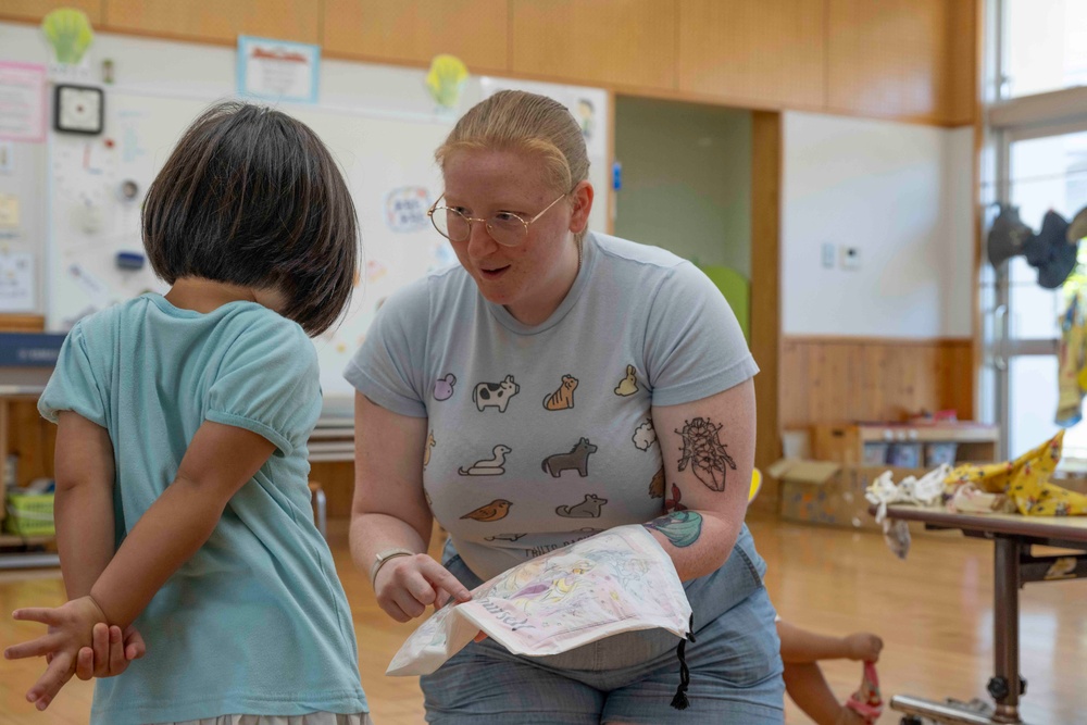 CFAO Sailors share storytime with children