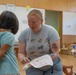 CFAO Sailors share storytime with children