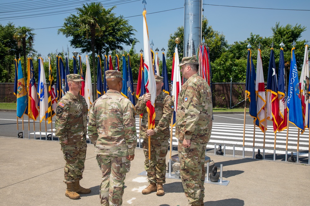 Maj. Gen. Dave Womack relinquishes command of U.S. Army Japan to Brig. Gen. James Dooghan, as Gen