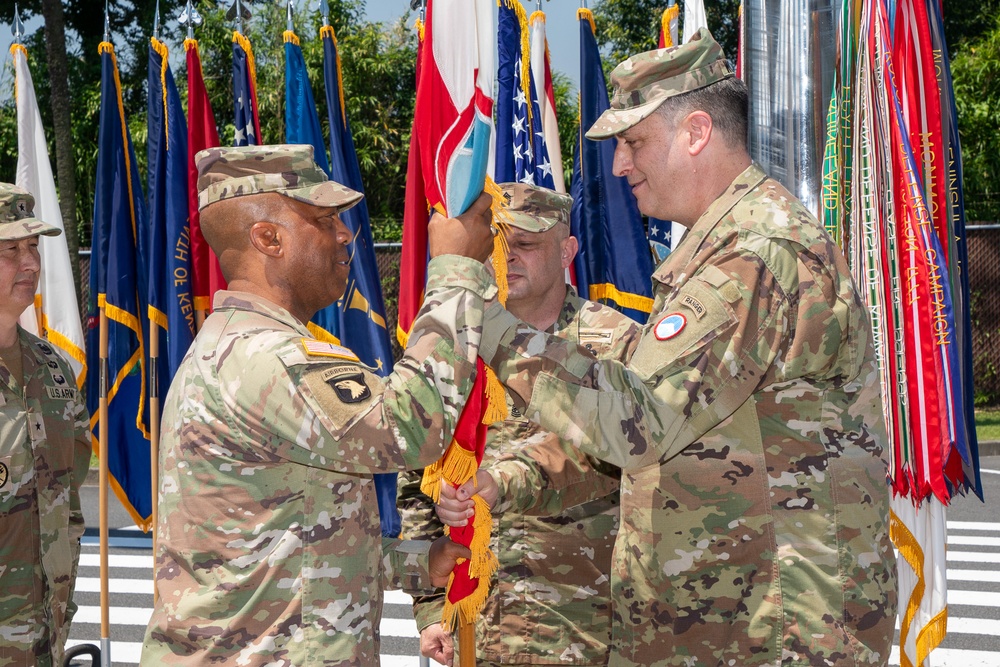 Maj. Gen. Dave Womack relinquishes command of U.S. Army Japan to Brig. Gen. James Dooghan, as Gen